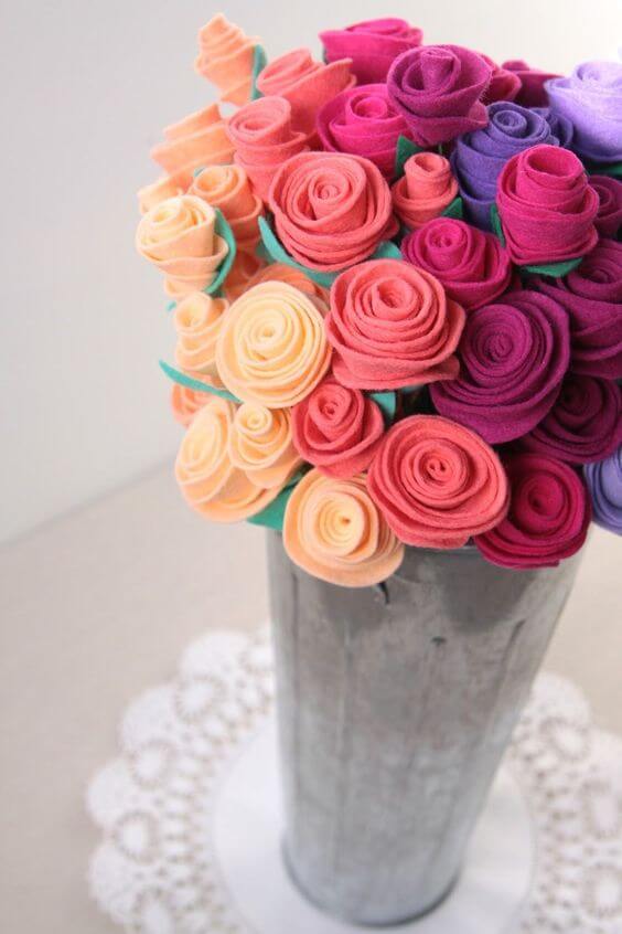 Vase with colorful felt flowers