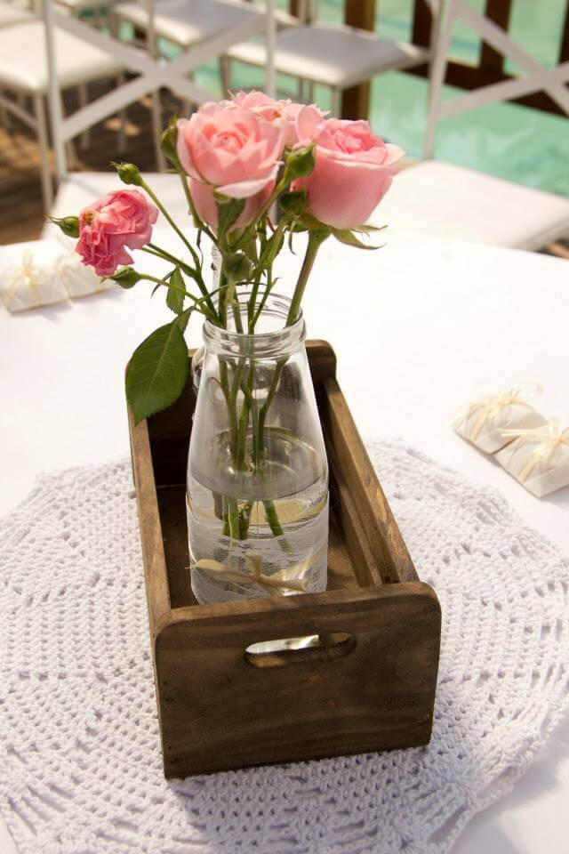 Centerpiece decorated with pink flowers