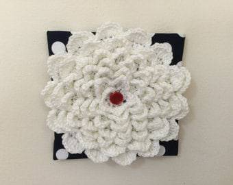 white crochet flower framed with button-min