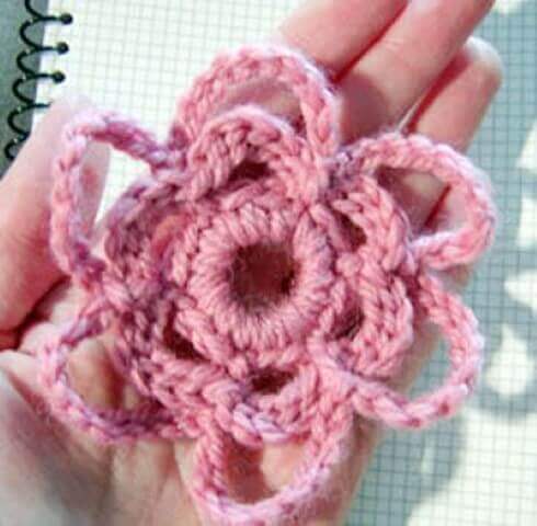 Different pink crochet flowers