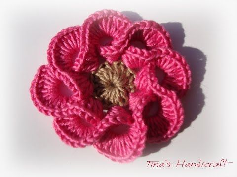 Pink crochet flowers with brown bud