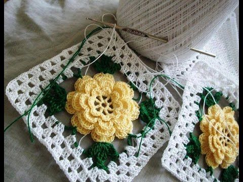 Yellow crochet flowers with green leaves