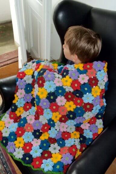 Crochet flowers on blanket