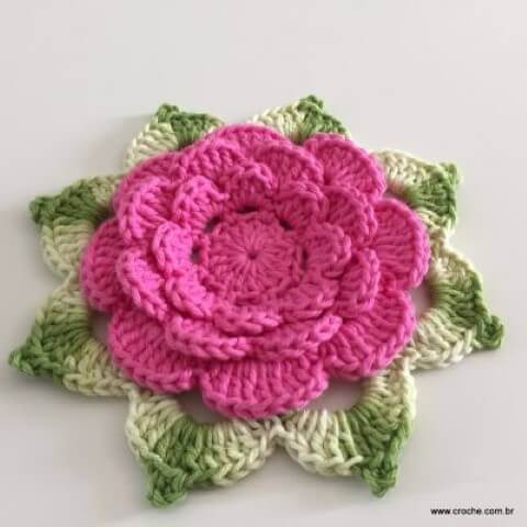 Pink crochet flowers with green leaf