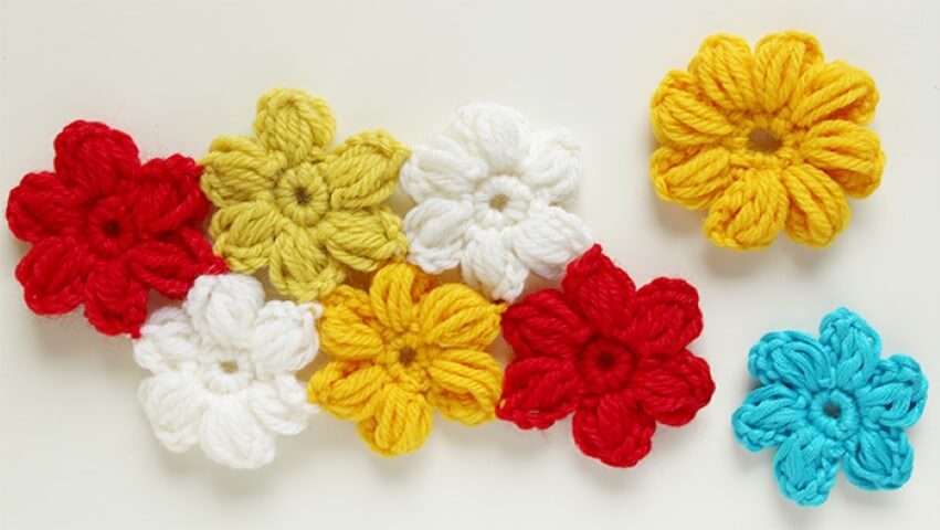 Colorful crochet flower together