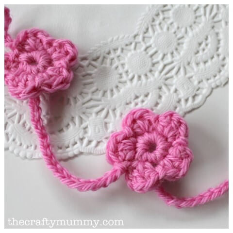 Small pink crochet flower