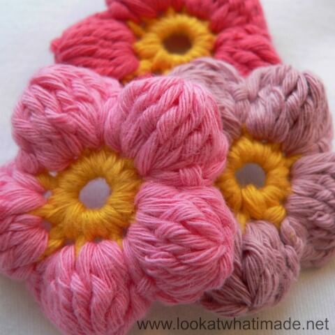 Crochet flower with pierced buttons