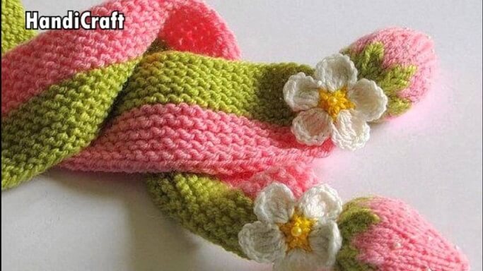 White crochet flower on garment