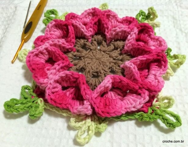 Pink crochet flower with brown center