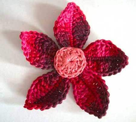 Crochet flower in pink tones