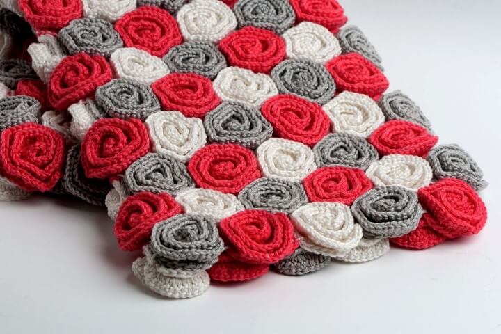 Red, gray and white crochet flower