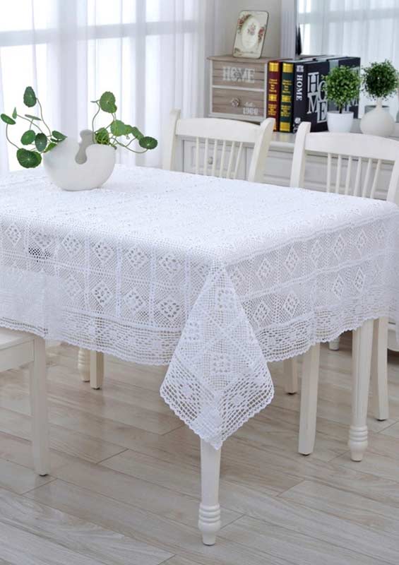 clean and delicate decor with white crochet tablecloth