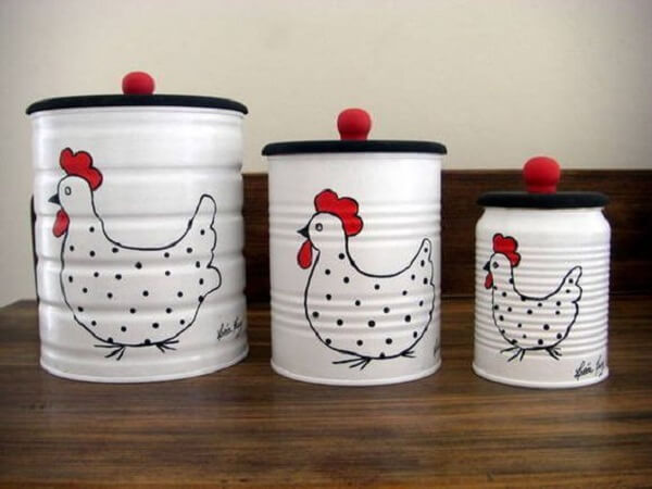 Set of cans decorated with white paint and chicken design