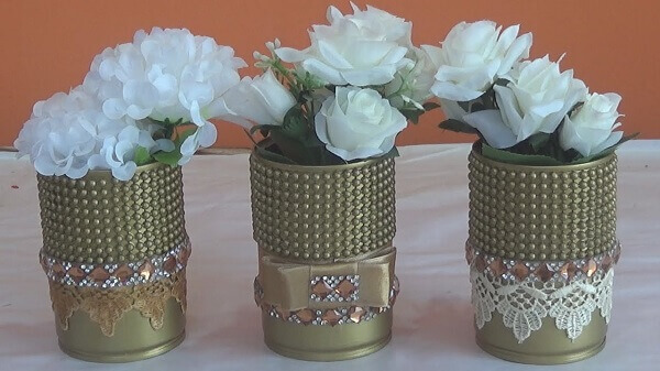 Cans decorated with pearls