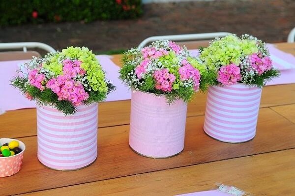 Decorated cans for flower arrangements