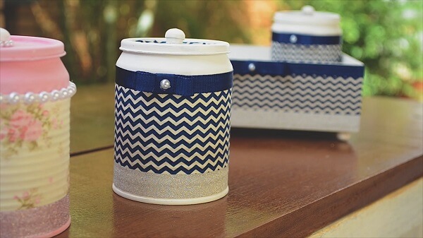 Cans decorated in blue fabric