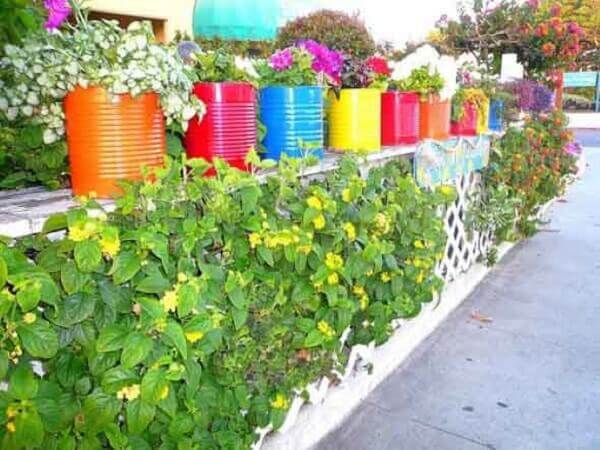 Colorful decorated garden cans
