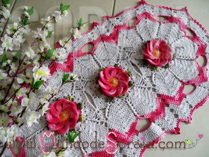 Oval crochet rug with rose flowers