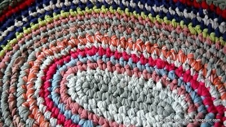 Oval crochet rug with various colors