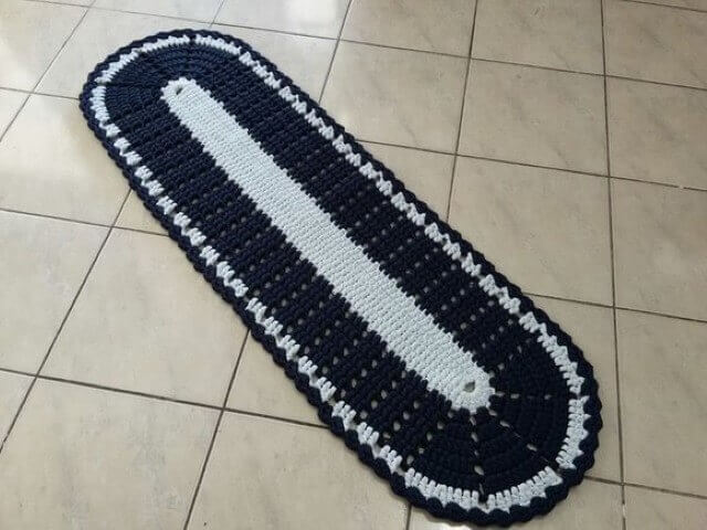 Black and white long oval crochet rug