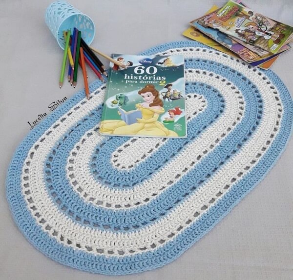 Blue and white oval crochet rug