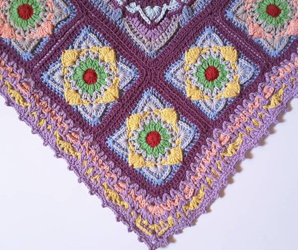 Colorful square crochet rug