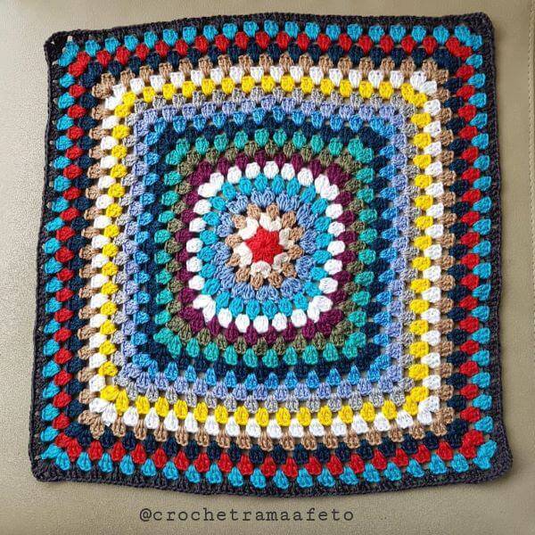 Colorful square crochet rug