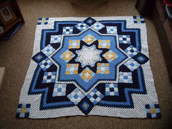 Square crochet rug with geometric print