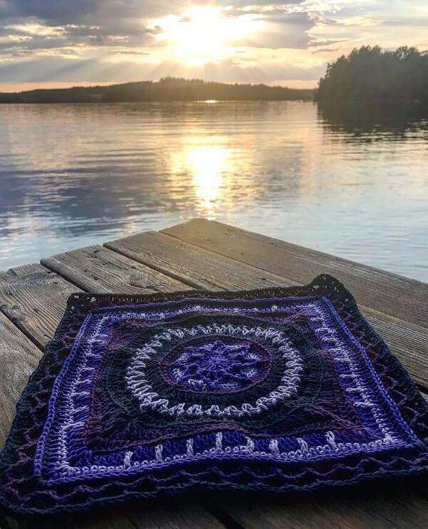 Navy blue and light blue square crochet rug