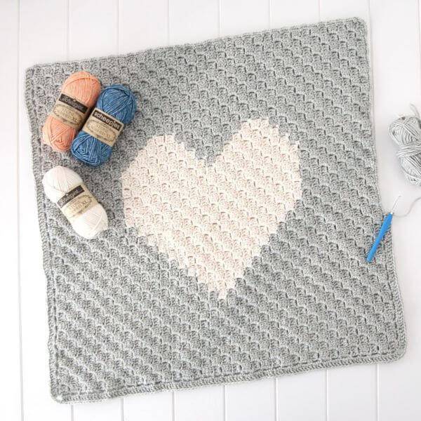 Square crochet kitchen rug with heart shape