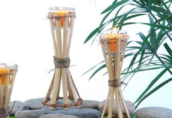 Handicraft with bamboo used in weddings serves as a basis for candles