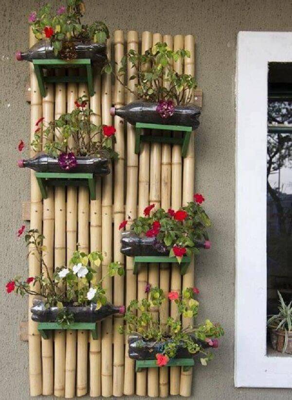 Vertical garden made of crafts with bamboo and pet bottle