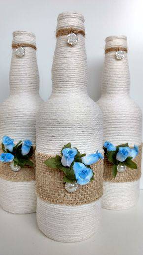 bottles decorated with string - bottle with jute, string and flowers