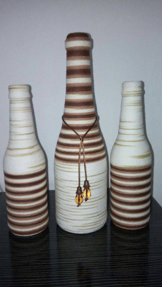 bottles decorated with string - bottles with colorful decoration