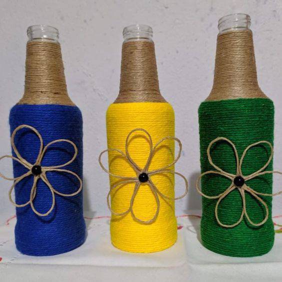 bottles decorated with string - colorful decorated bottles