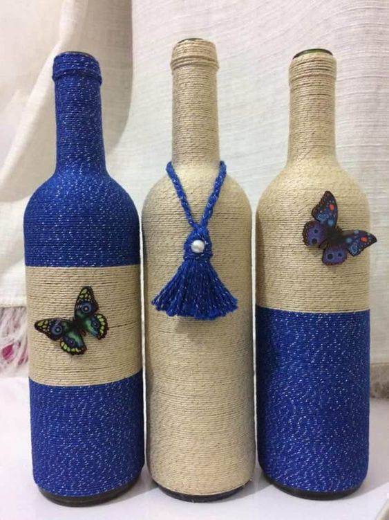 bottles decorated with string - bottles decorated with blue and brown string