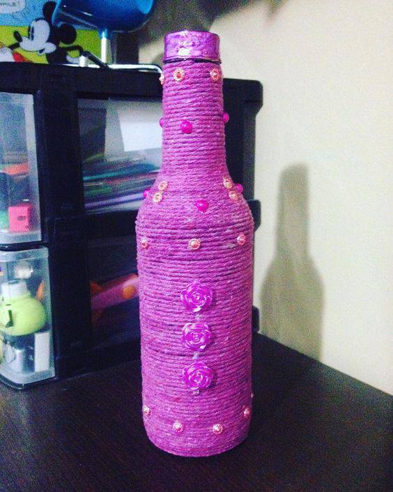 bottles decorated with string - flamboyant purple string