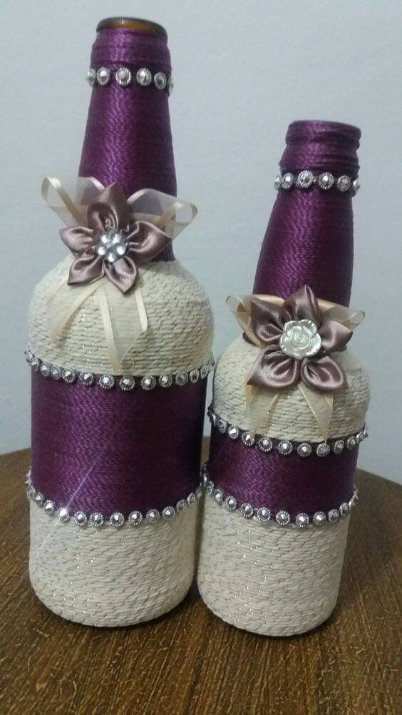 bottles decorated with string - bottle with purple and white string with flowers