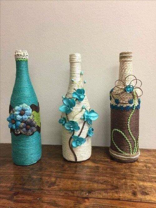 bottles decorated with string - colored bottles with flowers and string