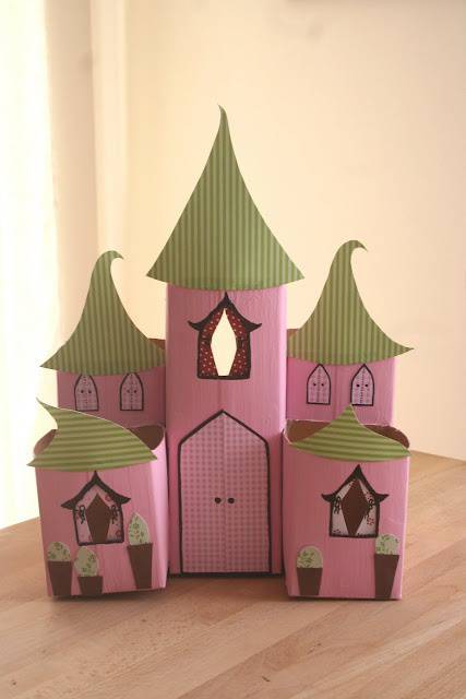 Handicraft with milk carton forms a beautiful pink castle