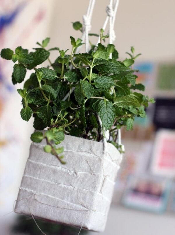 Handicraft with milk carton forms a charming vase