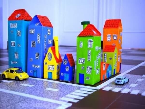 Handicraft with milk carton forms colorful houses