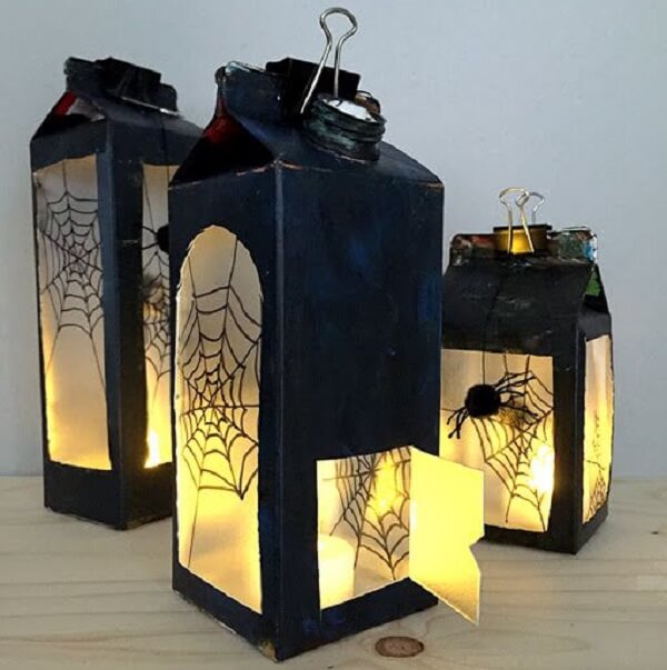 The craft with milk carton serves as a lantern for Halloween