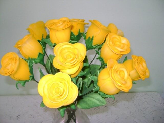 Yellow EVA roses in vase