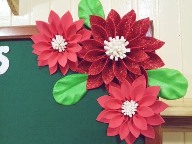 Red EVA flowers in green frame