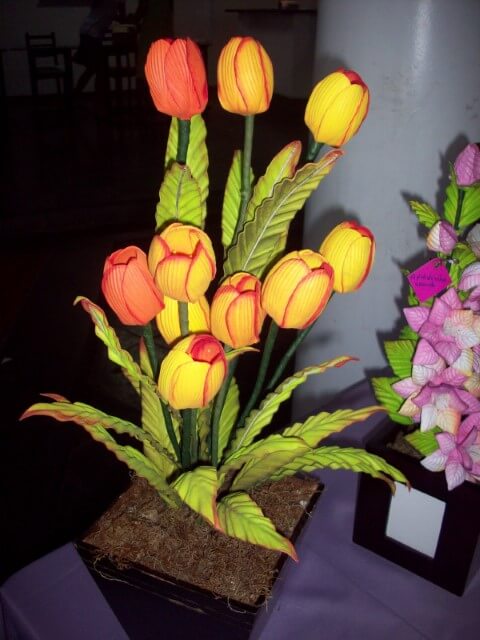 Yellow and orange EVA flowers in arrangement