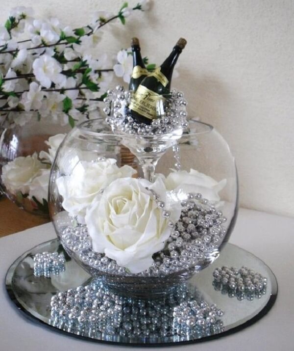 The white EVA flowers complement the glass pot decoration