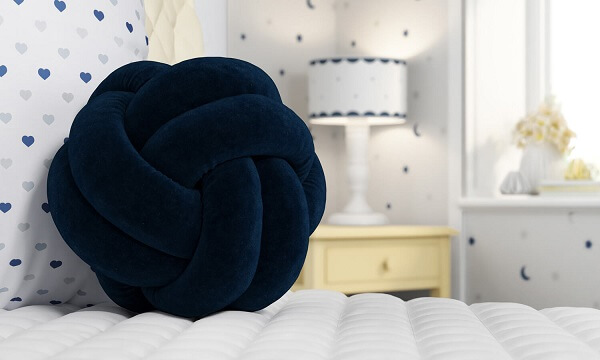 Invest in a dark knot pillow shade, if your decor is clean