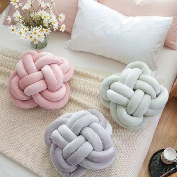 Knot cushion models in neutral tones