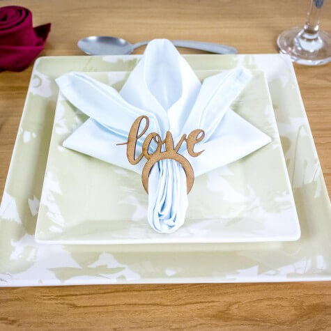 White fabric napkin with love ring